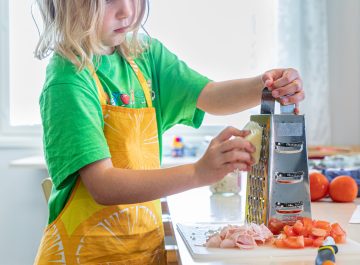 Hundratals barn deltar i sommarens matskolor Featured image
